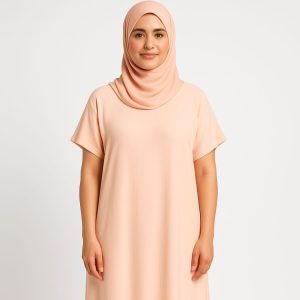 Step into timeless elegance with our Soft Peach Hijab Dress, designed for comfort, simplicity, and grace. Featuring a relaxed cut with a smooth, breathable fabric and a matching hijab, this outfit is perfect for daily wear or layering under abayas. ✅ Modest fit with short sleeves ✅ Soft stretchable fabric – lightweight & breathable ✅ Matching plain peach hijab included ✅ Perfect for casual wear, layering, or indoor modest dressing 📏 Free size – fits most (comfortable loose cut) 🎨 Color: Soft Peach (as shown)